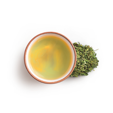 Cup of peppermint tea with peppermint leaves