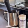 Evo & Zentvelds branded espresso machine cleaner - soaking baskets