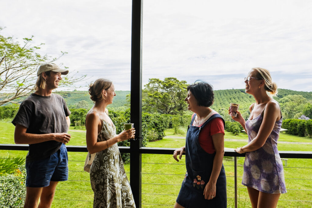 a group of people enjoying pesticide free coffee at Zentveld's Coffee Farm in the Byron Bay Hinterland 