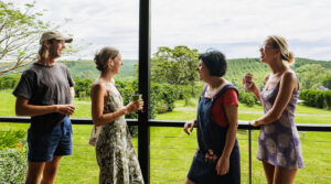 a group of people enjoying pesticide free coffee at Zentveld's Coffee Farm in the Byron Bay Hinterland