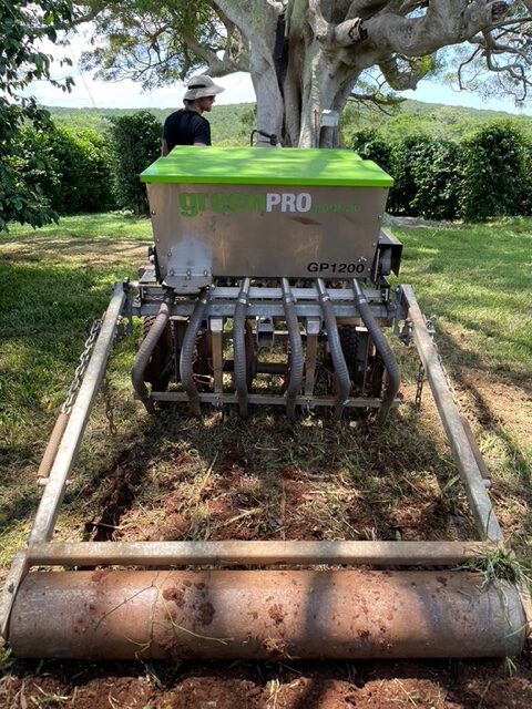 Green Pro seeder at end of row where we plant Covercrops for soil health and pollinators.